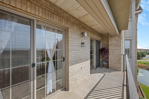 Tiny photo for 8515 Woodward Avenue #303, Woodridge, IL 60517 (MLS # 12795870)