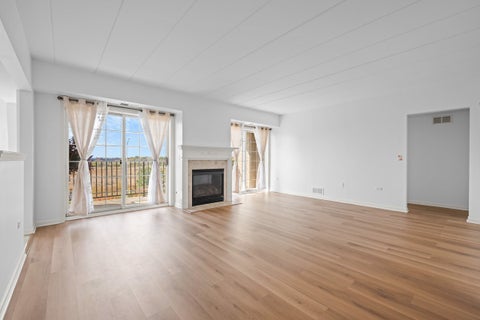Tiny photo for 8515 Woodward Avenue #303, Woodridge, IL 60517 (MLS # 12795870)