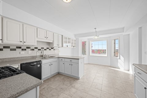 Tiny photo for 8515 Woodward Avenue #303, Woodridge, IL 60517 (MLS # 12795870)