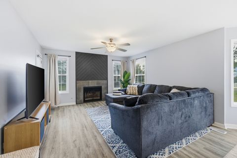 Tiny photo for 1924 Quaker Hollow Lane, Streamwood, IL 60107 (MLS # 12500232)