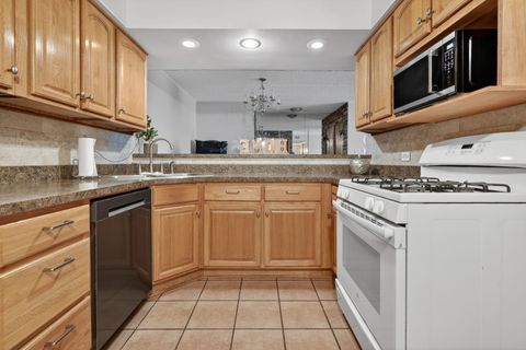 Tiny photo for 10571 Palos Place #B, Palos Hills, IL 60465 (MLS # 12690771)