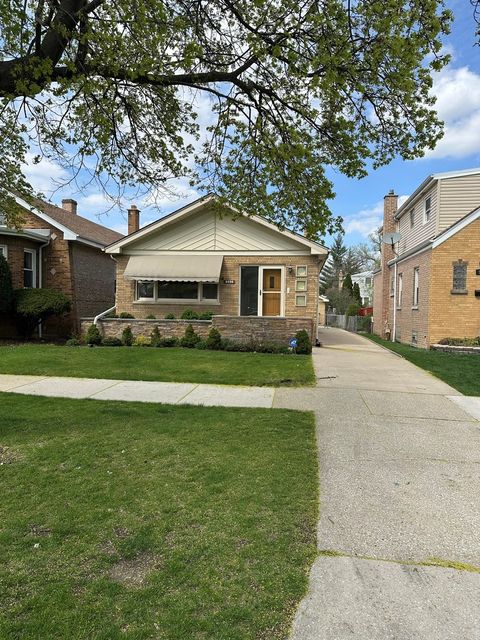 Photo of 5636 W Sunnyside Avenue, Chicago, IL 60630 (MLS # 12620308)