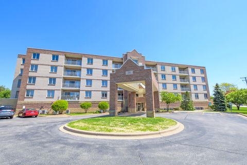 Photo of 201 W Brush Hill Road #305, Elmhurst, IL 60126 (MLS # 12636159)