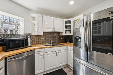 Tiny photo for 406 Oak Street #1E, Maywood, IL 60153 (MLS # 12485424)