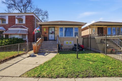 Photo of 9650 S WALLACE Street, Chicago, IL 60628 (MLS # 12600597)