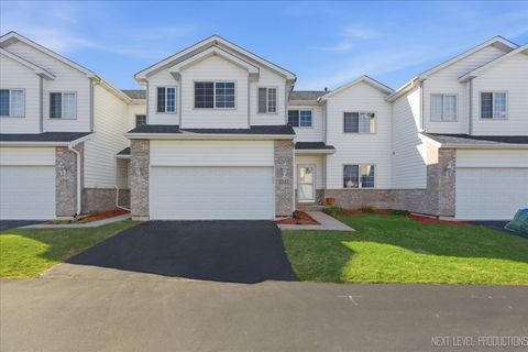 Photo of 1742 Waters Edge Drive #1742, Minooka, IL 60447 (MLS # 12604218)