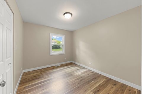 Tiny photo for 700 Pleasant Place, Streamwood, IL 60107 (MLS # 12301460)