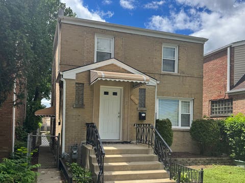 Photo of 10048 S Saint Lawrence Avenue, Chicago, IL 60628 (MLS # 12731235)