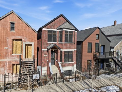 Photo of 1042 W 34th Place, Chicago, IL 60608 (MLS # 12570279)