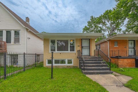 Photo of 11955 S Prairie Avenue, Chicago, IL 60628 (MLS # 12701657)