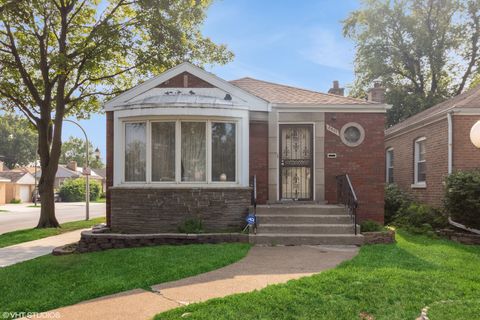 Photo of 8801 S CLYDE Avenue, Chicago, IL 60617 (MLS # 12429099)