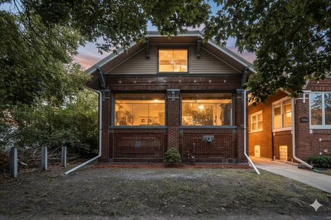 Photo of 7345 S Bennett Avenue, Chicago, IL 60649 (MLS # 12497236)