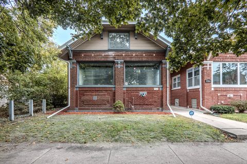Photo of 7345 S Bennett Avenue, Chicago, IL 60649 (MLS # 12497236)