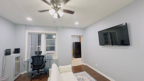 Tiny photo for 1411 W FARWELL Avenue #E2, Chicago, IL 60626 (MLS # 12512143)