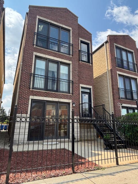Photo of 6611 W Belmont Avenue #1, Chicago, IL 60634 (MLS # 12713107)