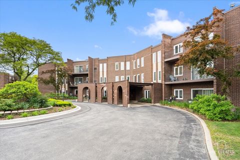 Photo of 1550 Sandpebble Drive #209, Wheeling, IL 60090 (MLS # 12378155)