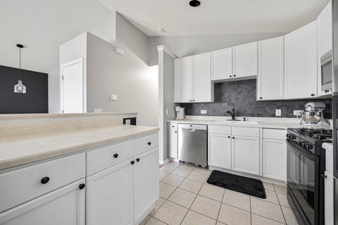 Tiny photo for 1002 Castleshire Drive, Woodstock, IL 60098 (MLS # 12714327)