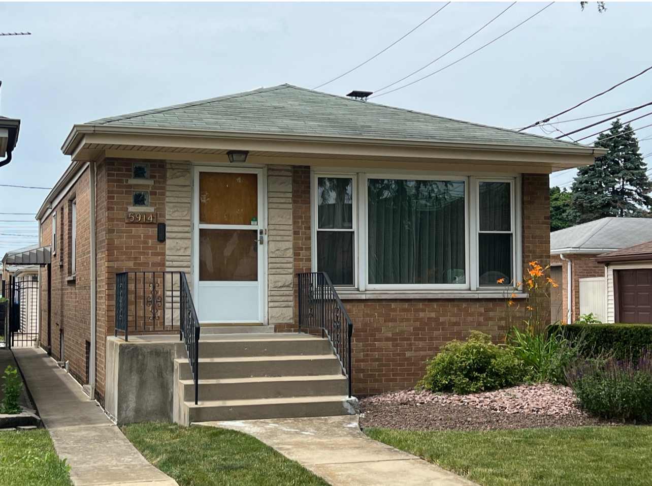 Photo 1 of 24 of 5914 S Menard Avenue house
