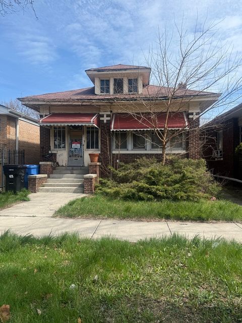 Photo of 7557 S Paxton Avenue, Chicago, IL 60649 (MLS # 12618220)