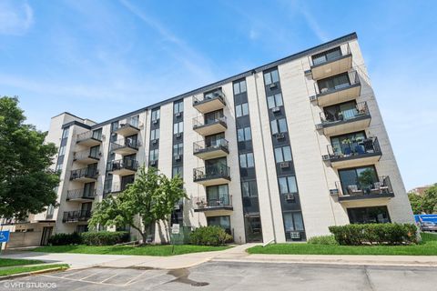 Photo of 9701 N Dee Road #2I, Niles, IL 60714 (MLS # 12487775)