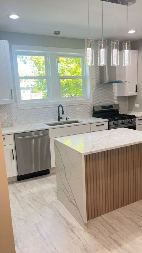 Tiny photo for 1201 S 15th Avenue, Maywood, IL 60153 (MLS # 12518427)