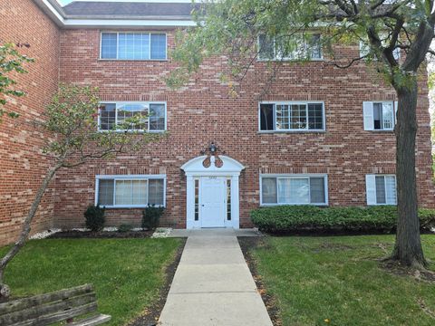 Photo of 6882 W Touhy Avenue #D, Niles, IL 60714 (MLS # 12491517)