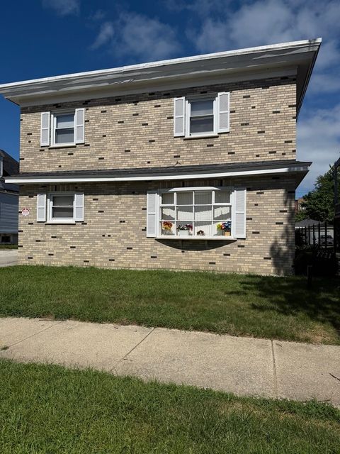 Photo of 7721 S Coles Avenue #G, Chicago, IL 60649 (MLS # 12482377)