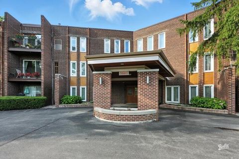 Photo of 1425 Sandpebble Drive #340, Wheeling, IL 60090 (MLS # 12525967)