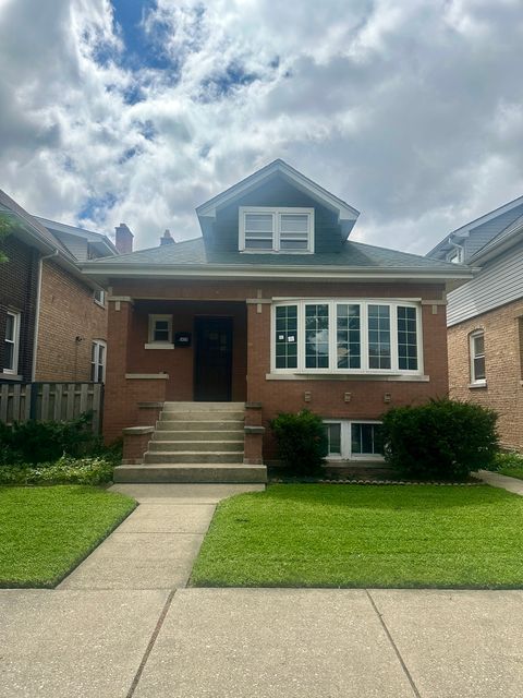 Photo of 5435 W MELROSE Street, Chicago, IL 60641 (MLS # 12492059)