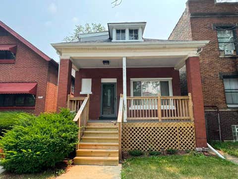 Photo of 7653 S Saint Lawrence Avenue, Chicago, IL 60619 (MLS # 12702390)
