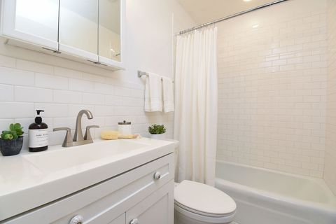 Tiny photo for 10357 Dearlove Road #1J, Glenview, IL 60025 (MLS # 12628009)