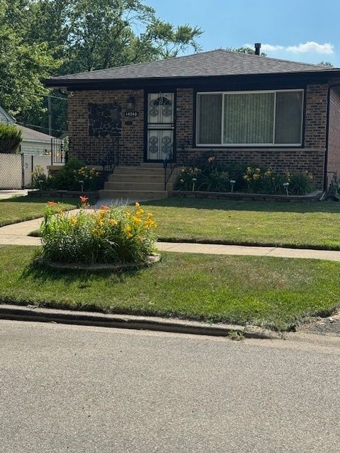 Photo of 14240 S Manistee Avenue, Burnham, IL 60633 (MLS # 12412467)