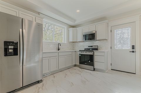 Tiny photo for 409 Algona Avenue, Elgin, IL 60120 (MLS # 12524728)