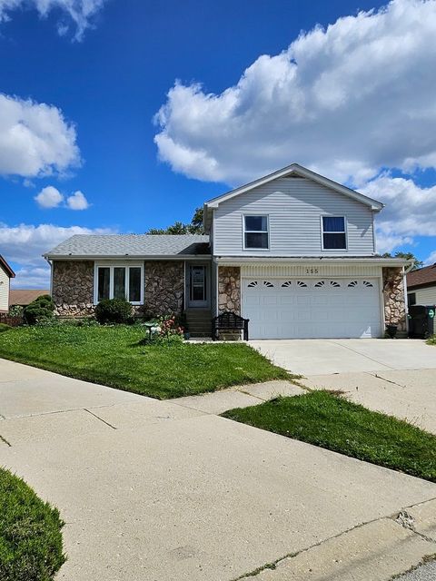 Photo of 155 HASTINGS MILL Road, Streamwood, IL 60107 (MLS # 12455029)