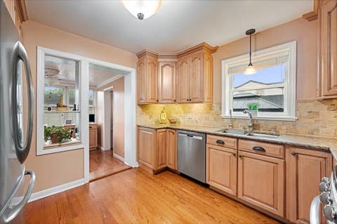Tiny photo for 7448 Keeler Avenue, Skokie, IL 60076 (MLS # 12690205)