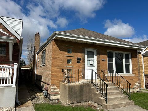 Photo of 5040 S LEAMINGTON Avenue, Chicago, IL 60638 (MLS # 12620576)