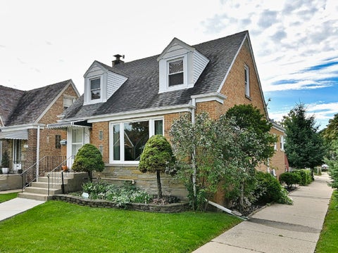 Photo of 7041 W SCHOOL Street, Chicago, IL 60634 (MLS # 12774515)