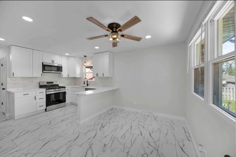 Tiny photo for 13921 S Manistee Avenue, Burnham, IL 60633 (MLS # 12476756)