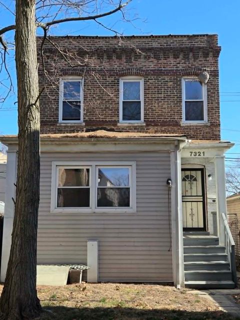 Photo of 7321 S Saint Lawrence Avenue, Chicago, IL 60619 (MLS # 12578276)