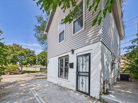 Photo of 1715 E 70th Street, Chicago, IL 60649 (MLS # 12472361)