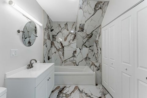 Tiny photo for 822 N Lockwood Avenue, Chicago, IL 60651 (MLS # 12485377)