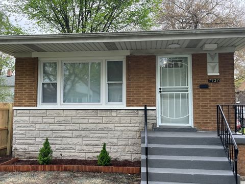 Photo of 7737 S Champlain Avenue, Chicago, IL 60619 (MLS # 12633956)