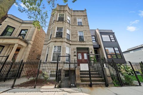 Photo of 4934 S Forrestville Avenue #1F, Chicago, IL 60615 (MLS # 12444682)