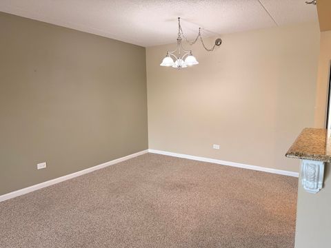 Tiny photo for 1 Bloomingdale Place #100, Bloomingdale, IL 60108 (MLS # 12625957)