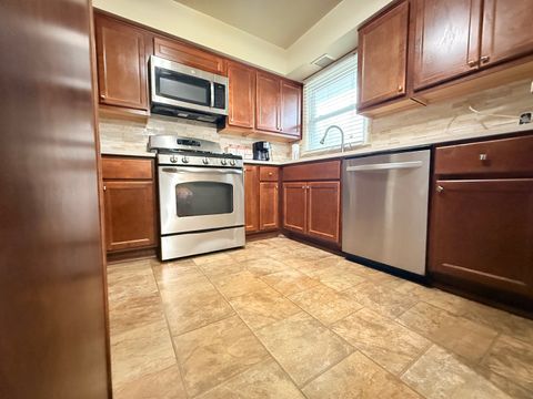 Tiny photo for 117 W 158th Place, Harvey, IL 60426 (MLS # 12617292)