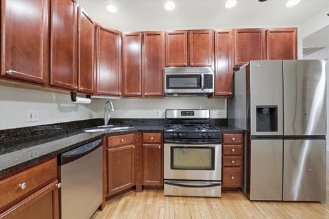 Tiny photo for 7404 N Oakley Avenue #1, Chicago, IL 60645 (MLS # 12671597)