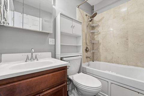 Tiny photo for 7404 N Oakley Avenue #1, Chicago, IL 60645 (MLS # 12671597)