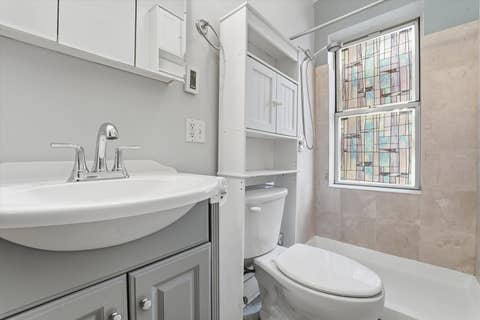 Tiny photo for 7404 N Oakley Avenue #1, Chicago, IL 60645 (MLS # 12671597)
