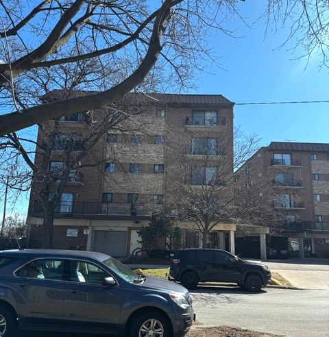 Photo of 2333 N Neva Avenue #404C, Chicago, IL 60707 (MLS # 12603593)