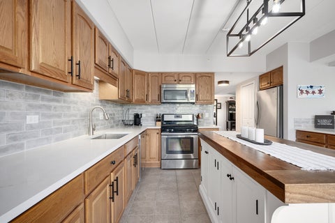 Tiny photo for 8505 Woodward Avenue #102, Woodridge, IL 60517 (MLS # 12655842)